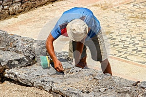 Butrint, Albania - Archaeologist Working with the Greek and Roman Ruins in Butrint UNESCO World Heritage