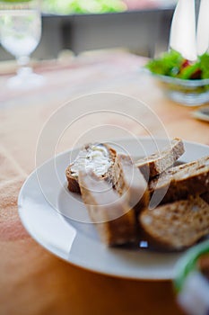 Butter Bread Sandwitch on a White Plate as Apatizer