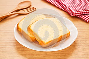 Butter cake sliced on plate