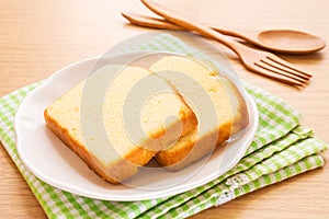 Butter cake sliced on plate