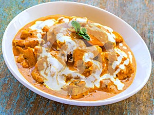 Butter Chicken - A Traditional Indian Chicken Curry Dish in a Bowl