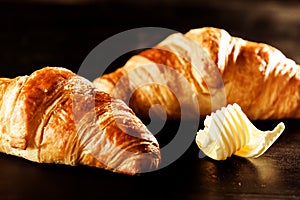 Butter and Croissant Bread on Top of a Table