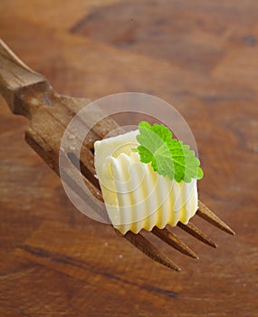 Butter curl garnished with mint