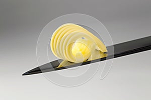Butter curl on a knife