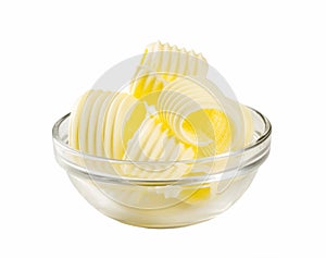 Butter curls in a glass bowl