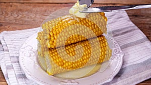 Butter melts on hot corn