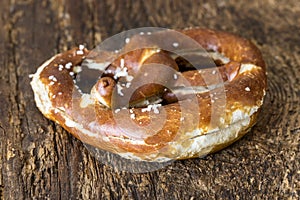 Butter pretzel on wood