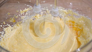 Butter, sugar and eggs beat with mixer.