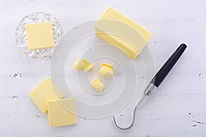 Butter on white wood table.