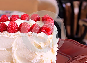 Buttercream frosting cake and Raspberries