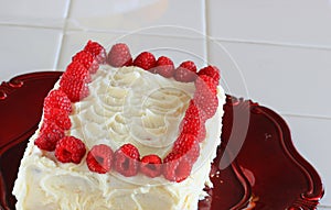 Buttercream frosting cake and Raspberries