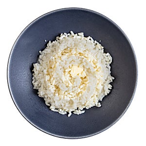 Buttered porridge from parboiled rice in gray bowl