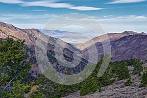 Butterfield Peak views of Oquirrh range toward Provo, Tooele, Utah Lake and Salt Lake County by Rio Tinto Bingham Copper Mine, in