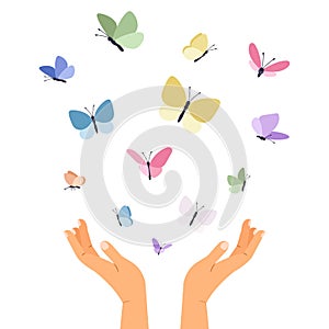 Butterflies flying from open hands