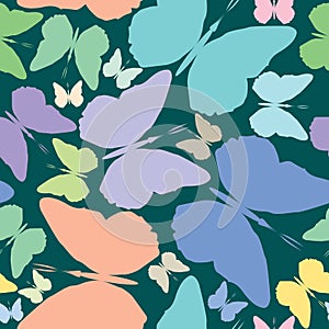 Butterflies seamless pattern over blue