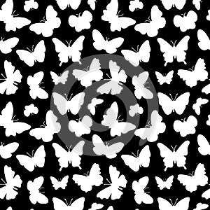 Butterfliy silhouettes pattern. Black and white print. Seamless background with butterflies flying insects. Vector repeat