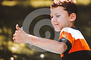 Butterfly in a child`s hand. butterfly on a child`s palm.