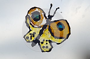 Butterfly drawn on glass