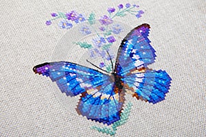 Butterfly and flower pattern embroidered on fabric