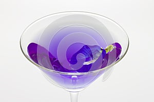 Butterfly pea flower juice in cocktail glass that is qualify as an antioxidant with clipping path photo