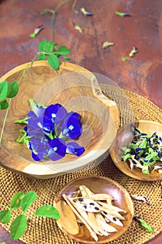 Butterfly pea flowers in rustic wooden bowl , it can use as natural coloring and healthy tea. 2