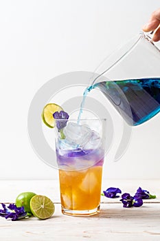 butterfly pea juice with honey and lime