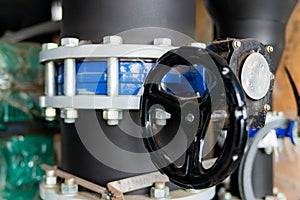 Butterfly valve at the connection hdpe pipe and pp-r pipe. Manual valve, selective focus