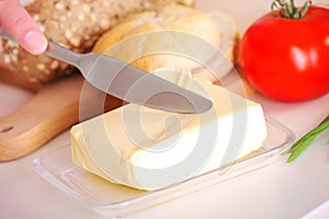 Buttering some bread