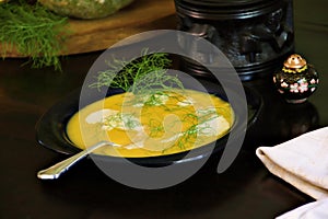 Butternut soup garnished with fennel and cream