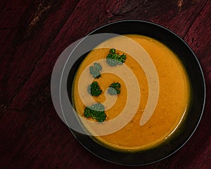 Butternut Squash Bisque in Black Bowl