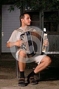 Button accordion playing evening serenade