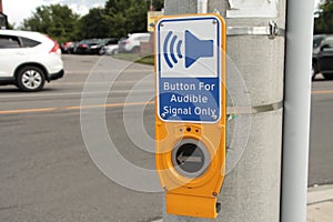 Button for audible signal only crosswalk button with illustration of speaker. P