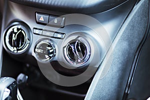 Button of a car airc