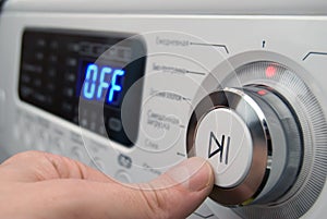 Button on a control of washing-machine panel