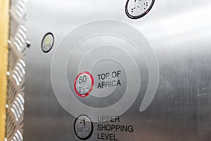 Button in the elevator indicating 50th floor named Top of Africa, Johannesburg