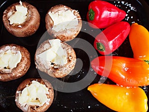 Button mushrooms with cheese and baby peppers