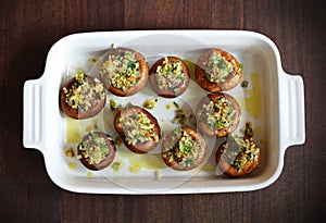 Button, portobello mushrooms stuffed with cheese and herbs
