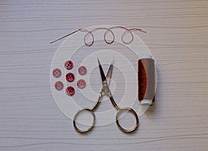 Button sewing kit: buttons, threads, needle, scissors