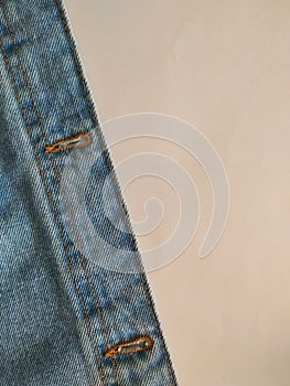 buttonholes for buttons on a denim jacket