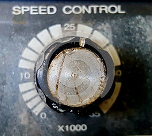 buttons on control panel of an old diry and dusty electric device