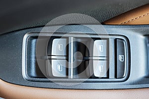 Buttons controlling the windows inside a car, control and electric mirror adjustment