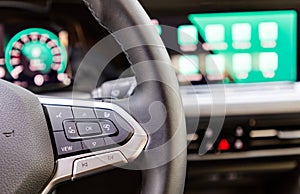 Buttons on steering wheel in a car