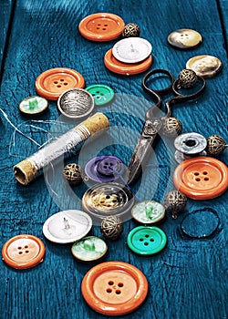 Buttons and zipper and sewing tool