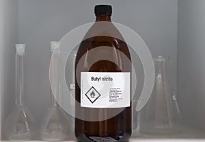butyl nitrite in glass, Hazardous chemicals and flammable symbols