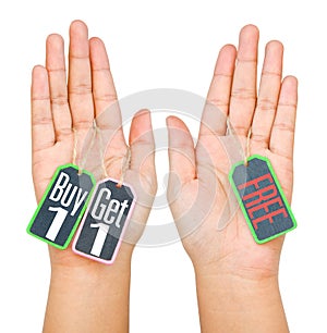 Buy 1 Get 1 label tag on women hand isolated on white background