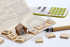Buy home wording with home model on account book