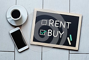 Buy not rent blackboard concept. Choosing buying over renting.