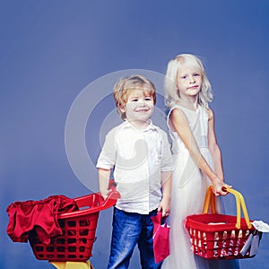 Buy products. Play shop game. Cute buyer customer client hold shopping cart. Girl and boy children shopping. Couple kids