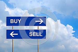 Buy and sell on blue road sign