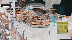 Buyer Buys Grilled Food and Transfers Money to the Seller at a Street Festival